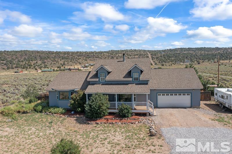 2920 Bullfrog Road Reno, NV 89521 - Photo 3 of 40 a front view of a house with a yard