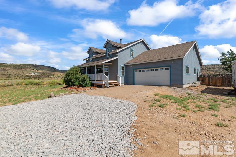 2920 Bullfrog Road Reno, NV 89521 - Photo 4 of 40 a front view of a house with a yard