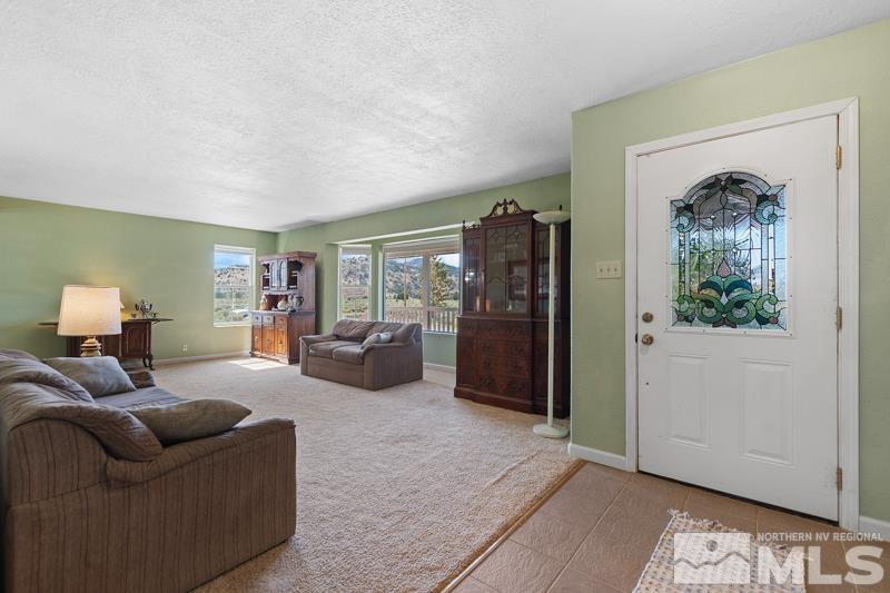 2920 Bullfrog Road Reno, NV 89521 - Photo 8 of 40 a living room with furniture and a window