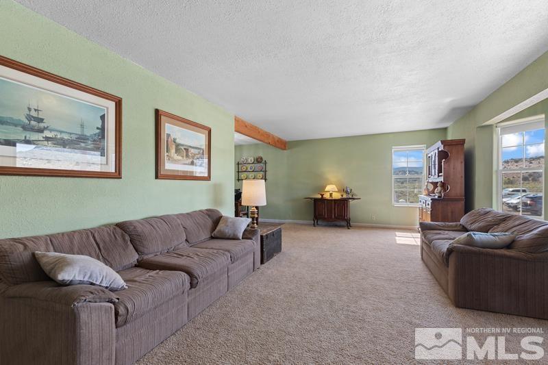 2920 Bullfrog Road Reno, NV 89521 - Photo 9 of 40 a living room with furniture and a couch
