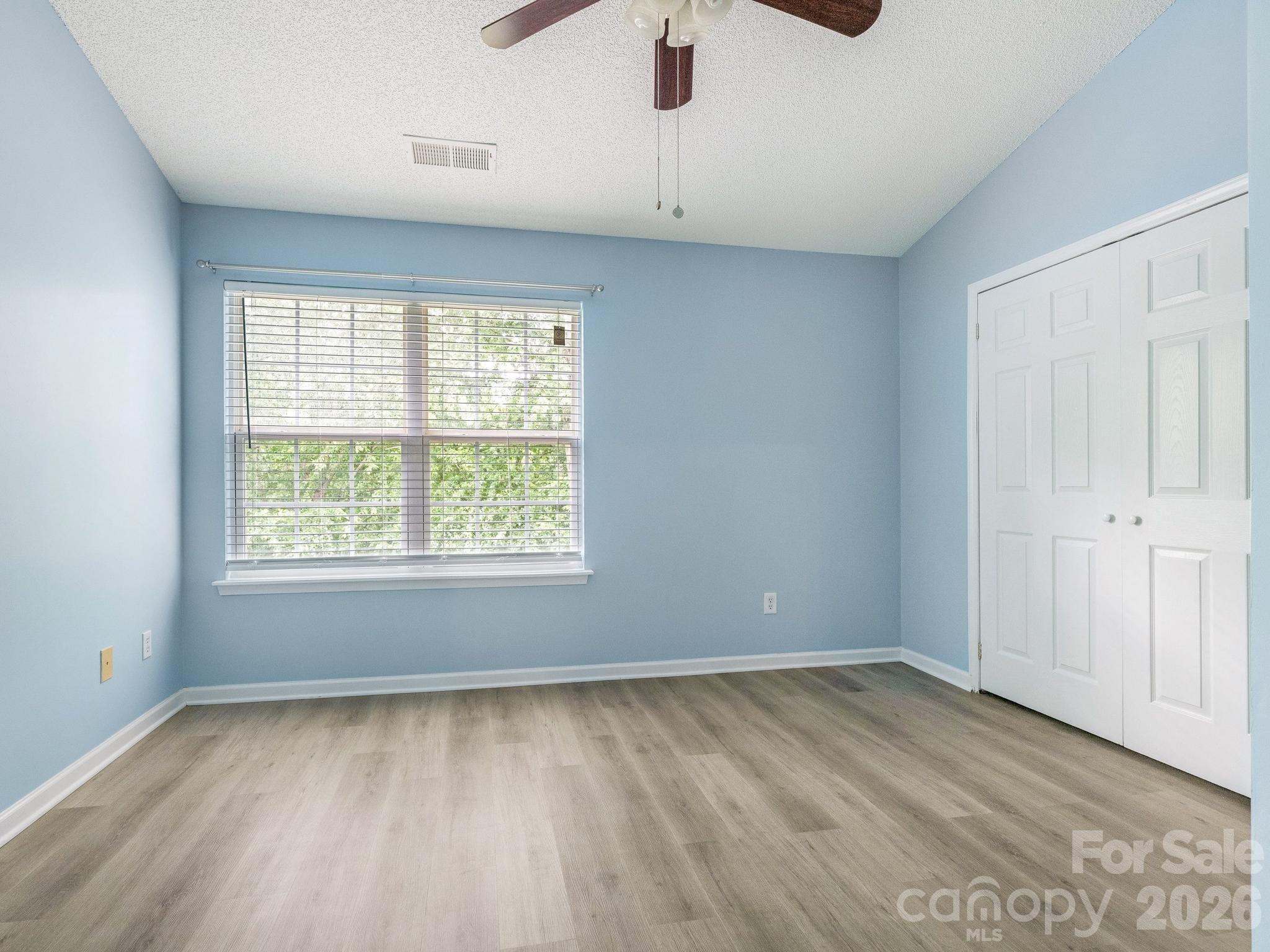 3259 Blythe Ridge Court Charlotte, NC 28213 - Photo 9 of 17 an empty room with a window
