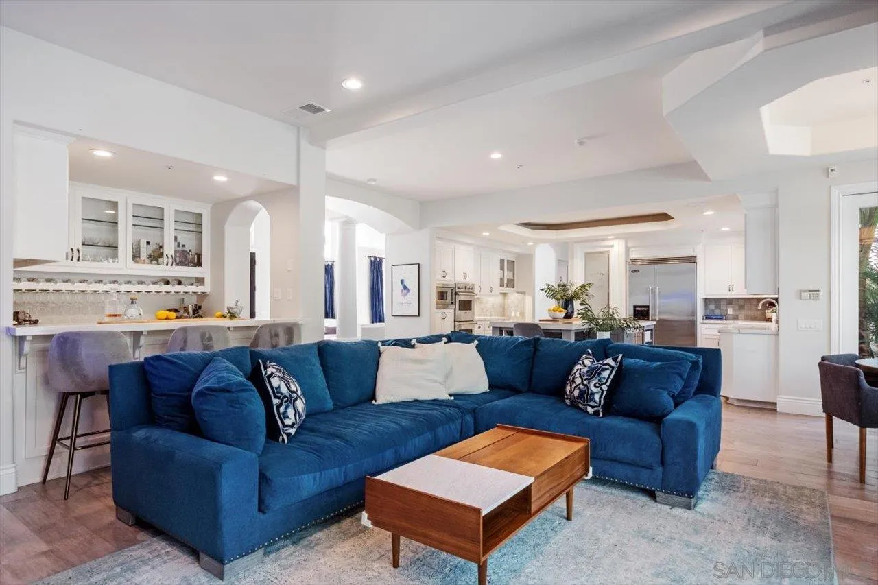 16270 Windpiper Road Poway, CA 92064 - Photo 16 of 65 a living room with furniture and kitchen view