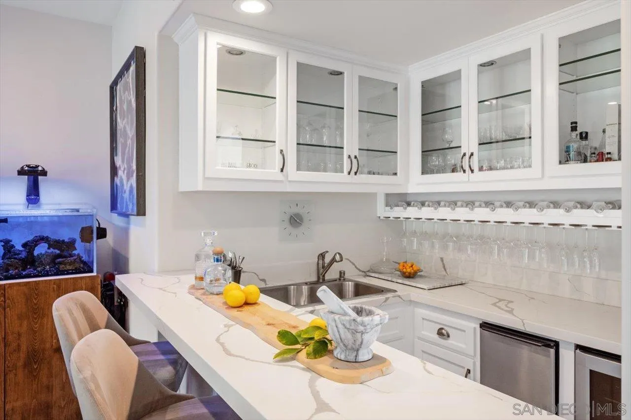 16270 Windpiper Road Poway, CA 92064 - Photo 17 of 65 a kitchen with stainless steel appliances granite countertop a sink and cabinets