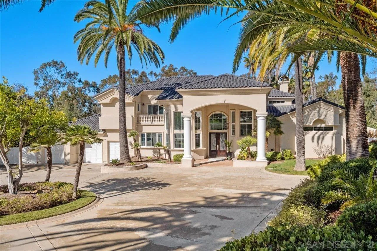 16270 Windpiper Road Poway, CA 92064 - Photo 2 of 65 a view of a building with a yard and palm trees