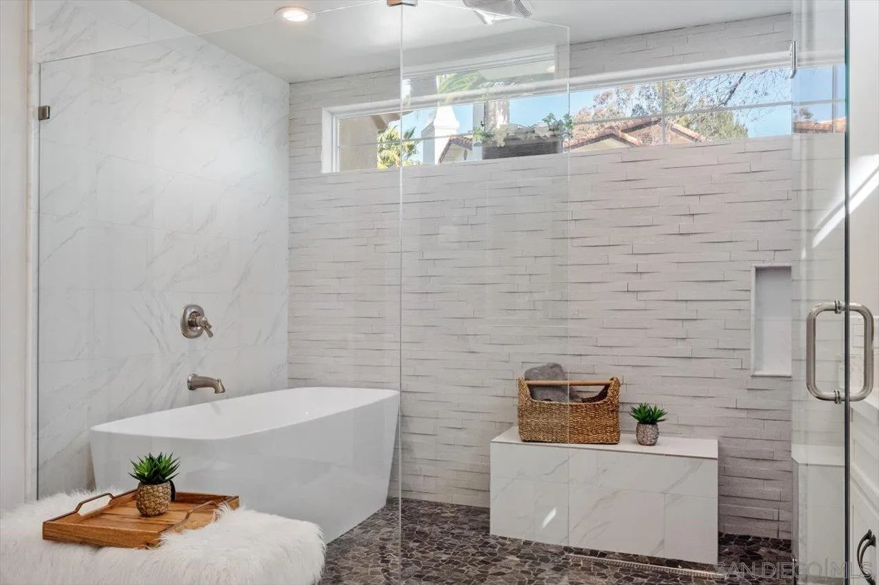 16270 Windpiper Road Poway, CA 92064 - Photo 24 of 65 a bathroom with a bathtub and sink