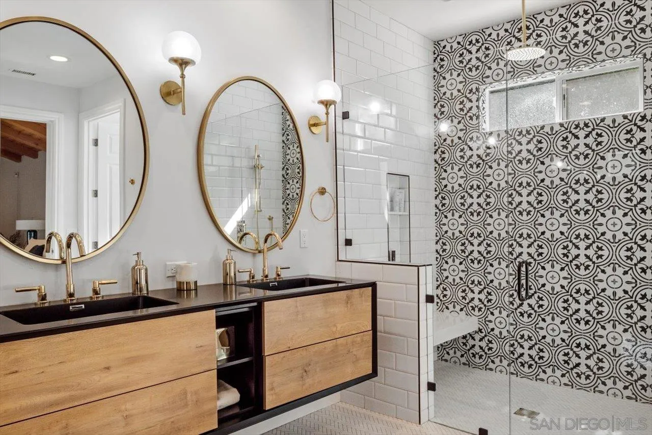 16270 Windpiper Road Poway, CA 92064 - Photo 28 of 65 a bathroom with a sink and a mirror