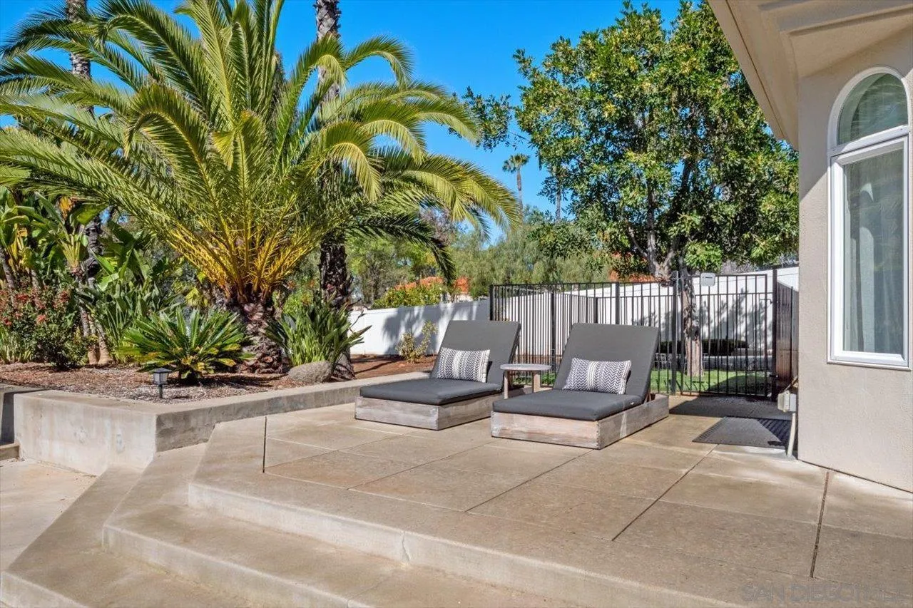 16270 Windpiper Road Poway, CA 92064 - Photo 34 of 65 a view of a patio with chairs and potted plants