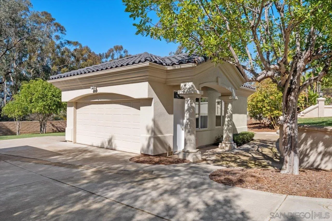 16270 Windpiper Road Poway, CA 92064 - Photo 35 of 65 a front view of a house with a yard