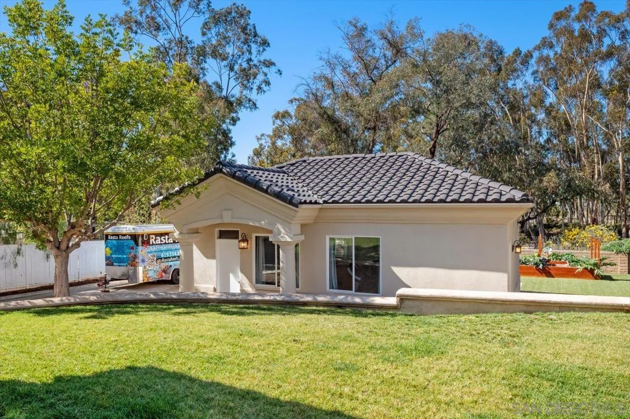 16270 Windpiper Road Poway, CA 92064 - Photo 36 of 65 a front view of a house with swimming pool having outdoor seating