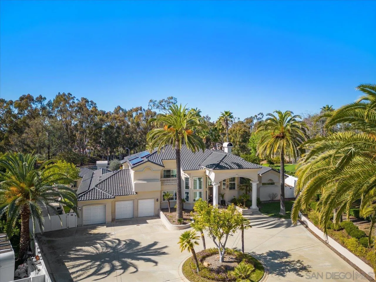 16270 Windpiper Road Poway, CA 92064 - Photo 46 of 65 a front view of a house with a yard