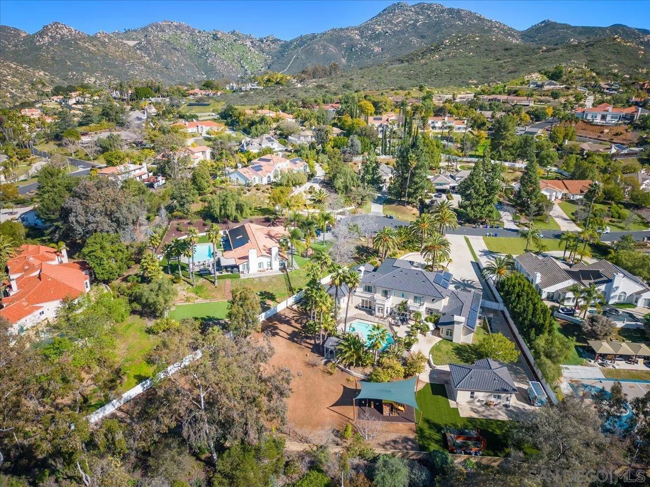 16270 Windpiper Road Poway, CA 92064 - Photo 47 of 65 an aerial view of residential house with yard and mountain view in back