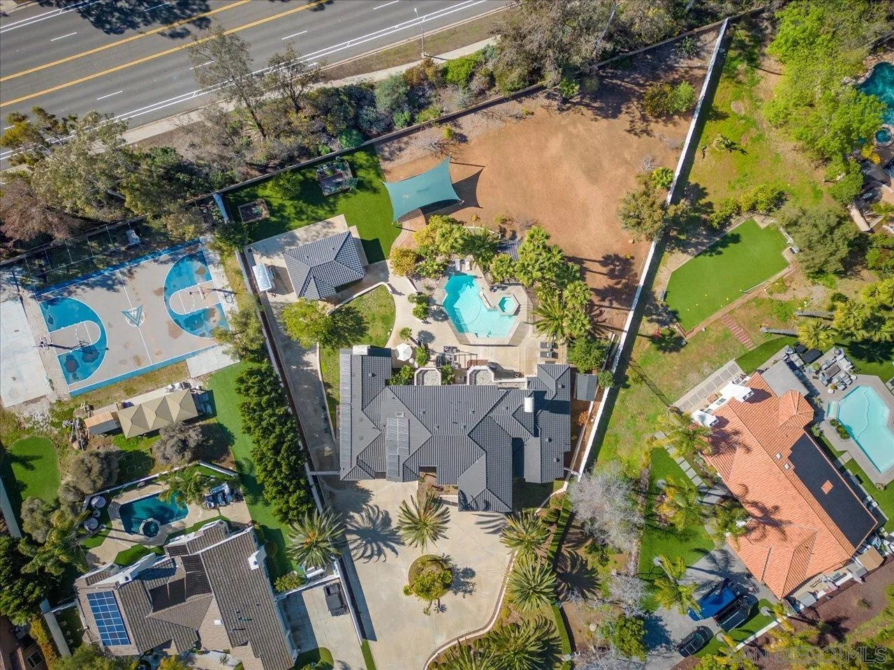 16270 Windpiper Road Poway, CA 92064 - Photo 64 of 65 an aerial view of a house with a yard and a large tree