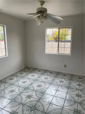 a view of a livingroom with window and outdoor space
