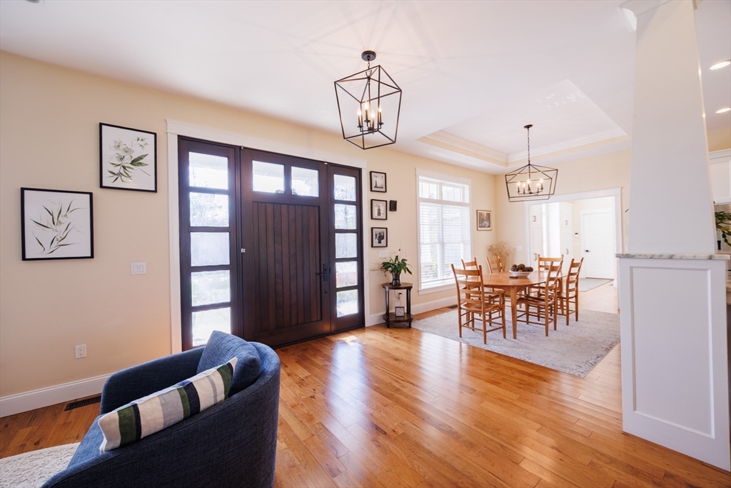 1776 Old Turnpike Road Oakham, MA 01068 - Photo 4 of 42 a living room with furniture and a wooden floor