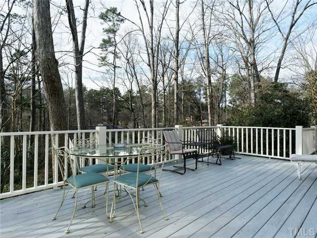 4413 Pitt Street Raleigh, NC 27609 - Photo 11 of 25 a view of deck with furniture and trees