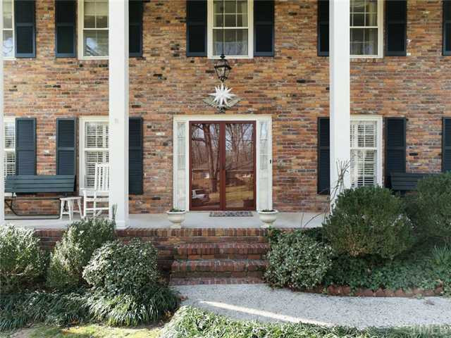 4413 Pitt Street Raleigh, NC 27609 - Photo 2 of 25 a front view of a house with a garden