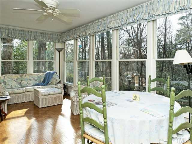 4413 Pitt Street Raleigh, NC 27609 - Photo 9 of 25 a living room with furniture and a large window