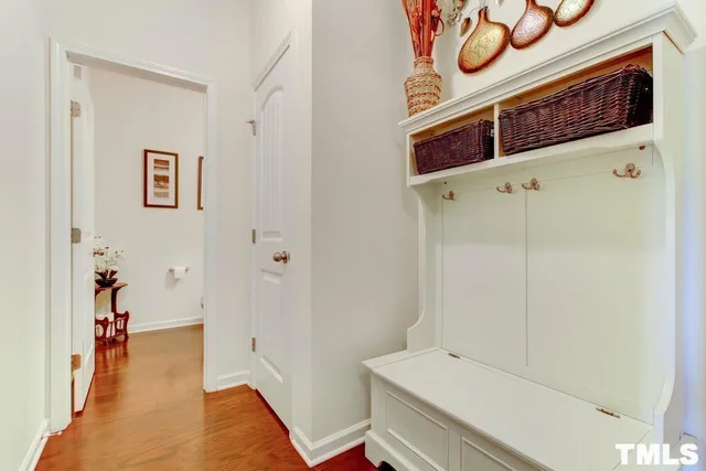 a hallway with wooden floor