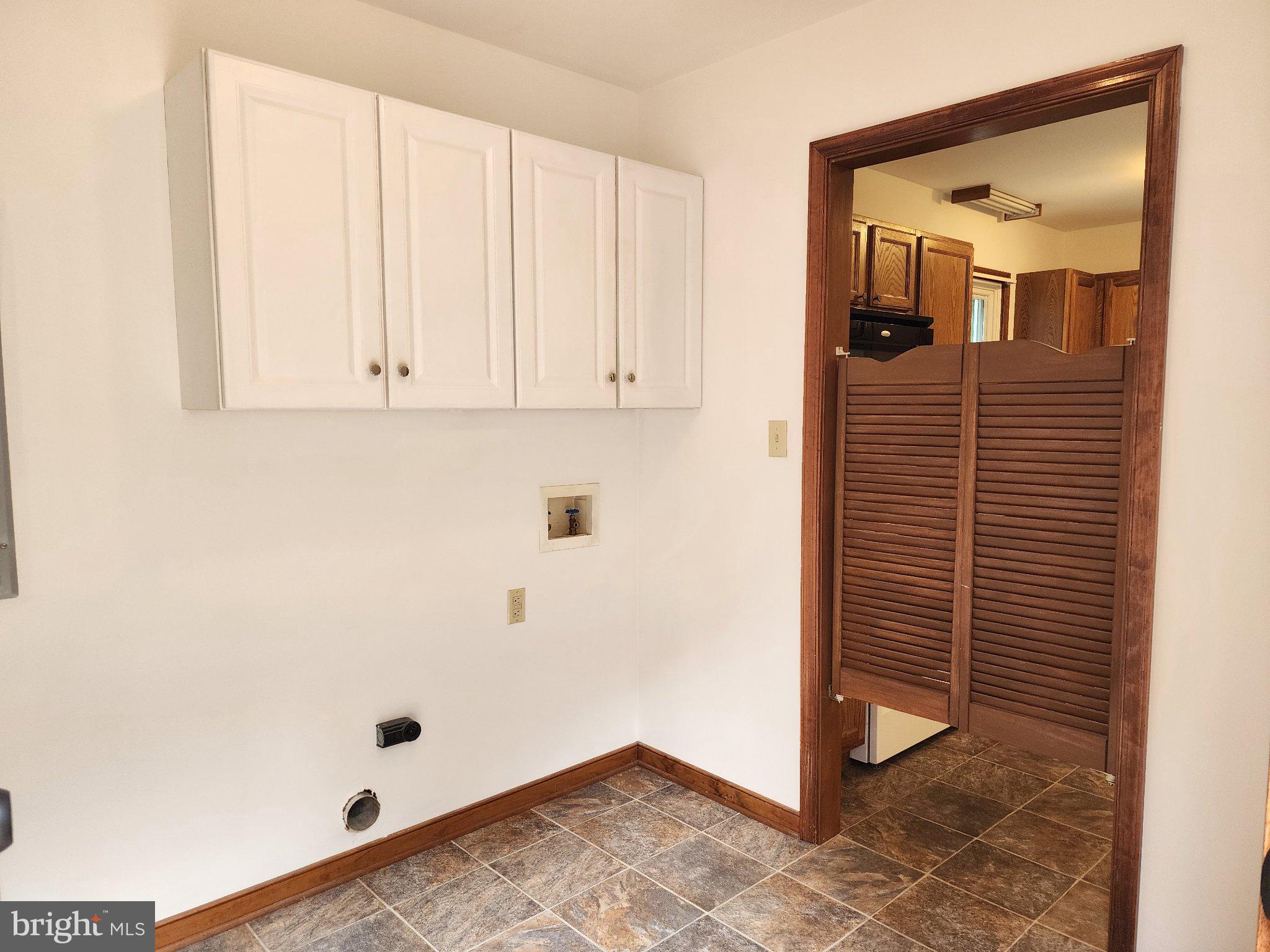 652 Jackson Road Bumpass, VA 23024 - Photo 9 of 18 Bright and functional laundry space.