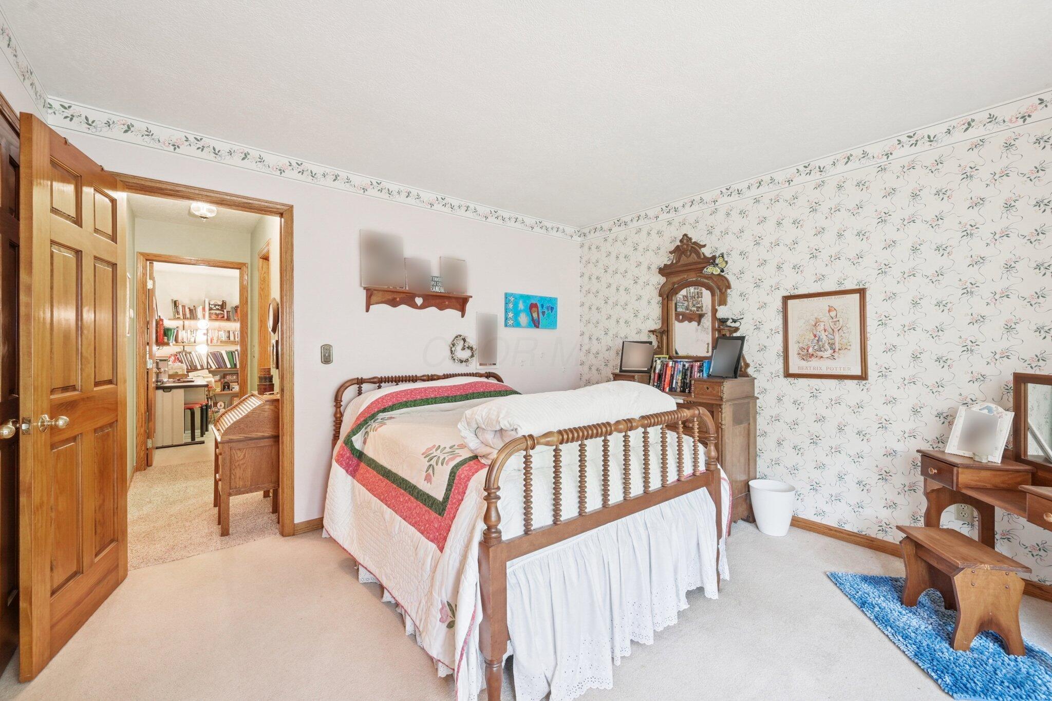 7700 Plumb Road Galena, OH 43021 - Photo 67 of 94 Second view of guest bedroom showcasing vintage furnishings and direct access to hallway.