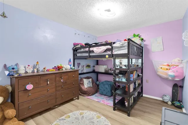 a bed room with furniture and decor