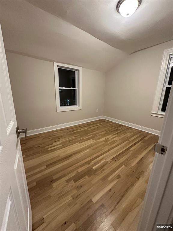 65 Lincoln Place, Unit 2 Garfield, NJ 07026 - Photo 13 of 13 a view of an empty room with a window