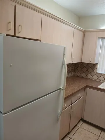 a close view of a refrigerator in a kitchen