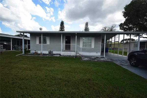 a view of a porch with a yard
