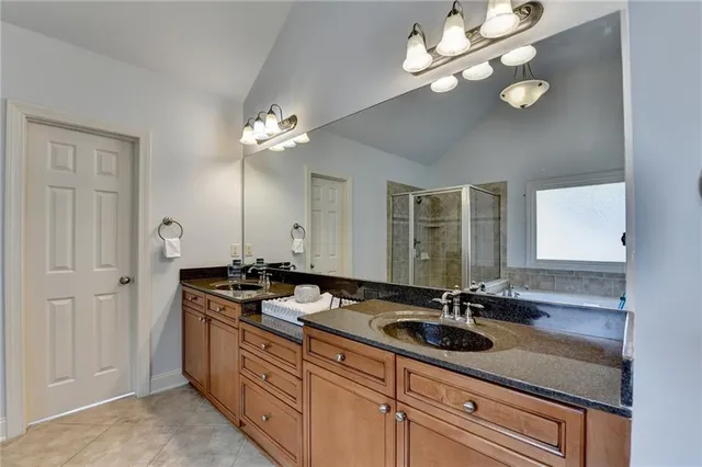 a bathroom with a sink a light fixture and a light fixture