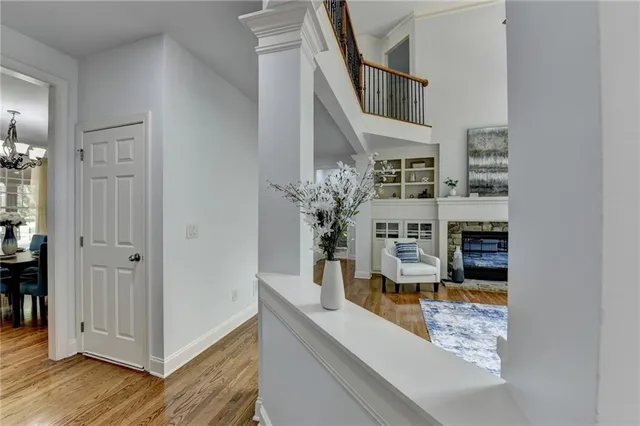 a view of living room with furniture and wooden floor