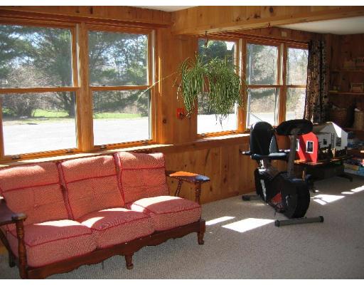466 Warren Wright Road Belchertown, MA 01007 - Photo 6 of 10 a living room with furniture and a window