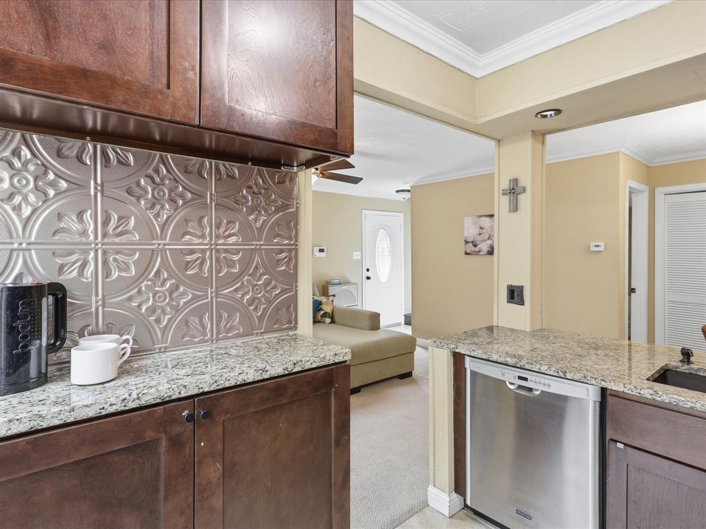 4250 Madera Road Irving, TX 75038 - Photo 13 of 31 a bathroom with a granite countertop double vanity sink and mirror