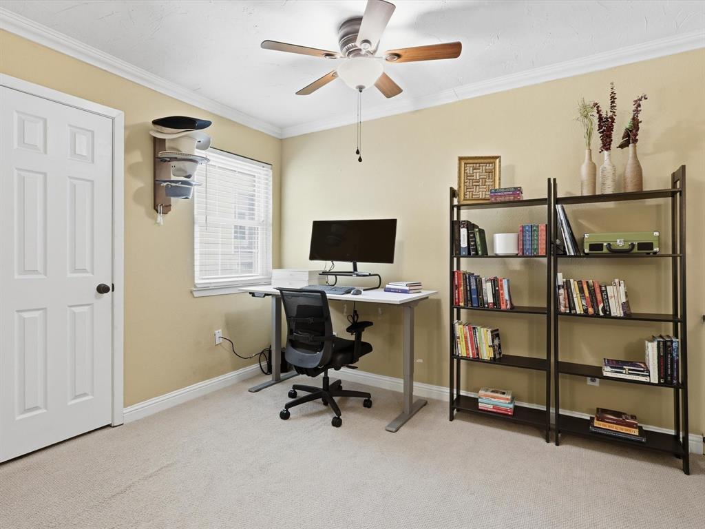 4250 Madera Road Irving, TX 75038 - Photo 25 of 31 a view of a workspace with furniture and a window
