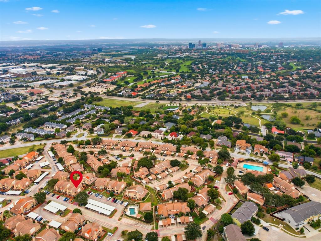 4250 Madera Road Irving, TX 75038 - Photo 31 of 31 an aerial view of residential building with parking and yard