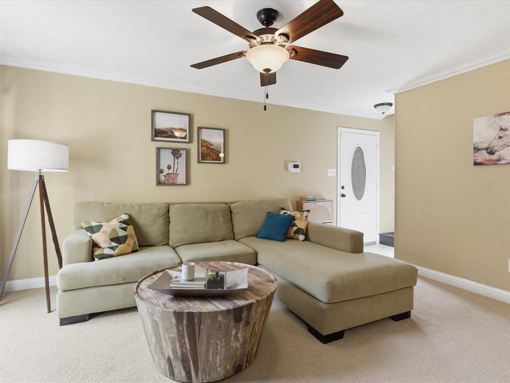 4250 Madera Road Irving, TX 75038 - Photo 6 of 31 a living room with furniture and a couch