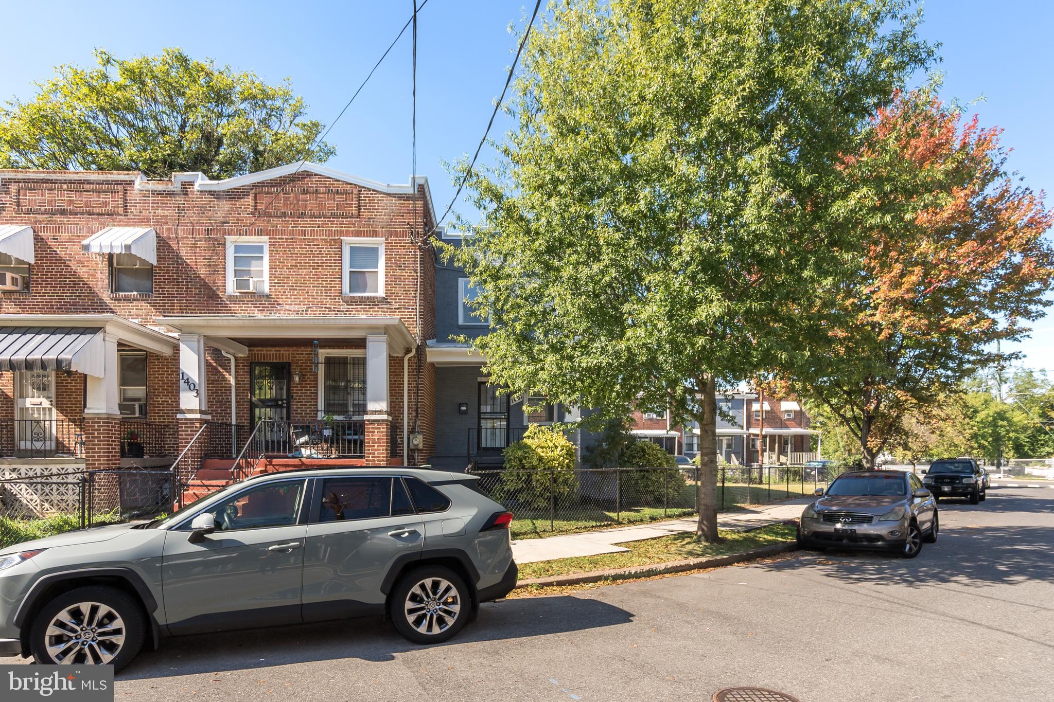 a view of a car parked in front of a buildings