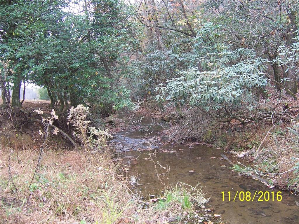 0 Gentry Road Elkin, NC 28621 - Photo 16 of 30 This is down stream after flowing over the huge rock across the creek