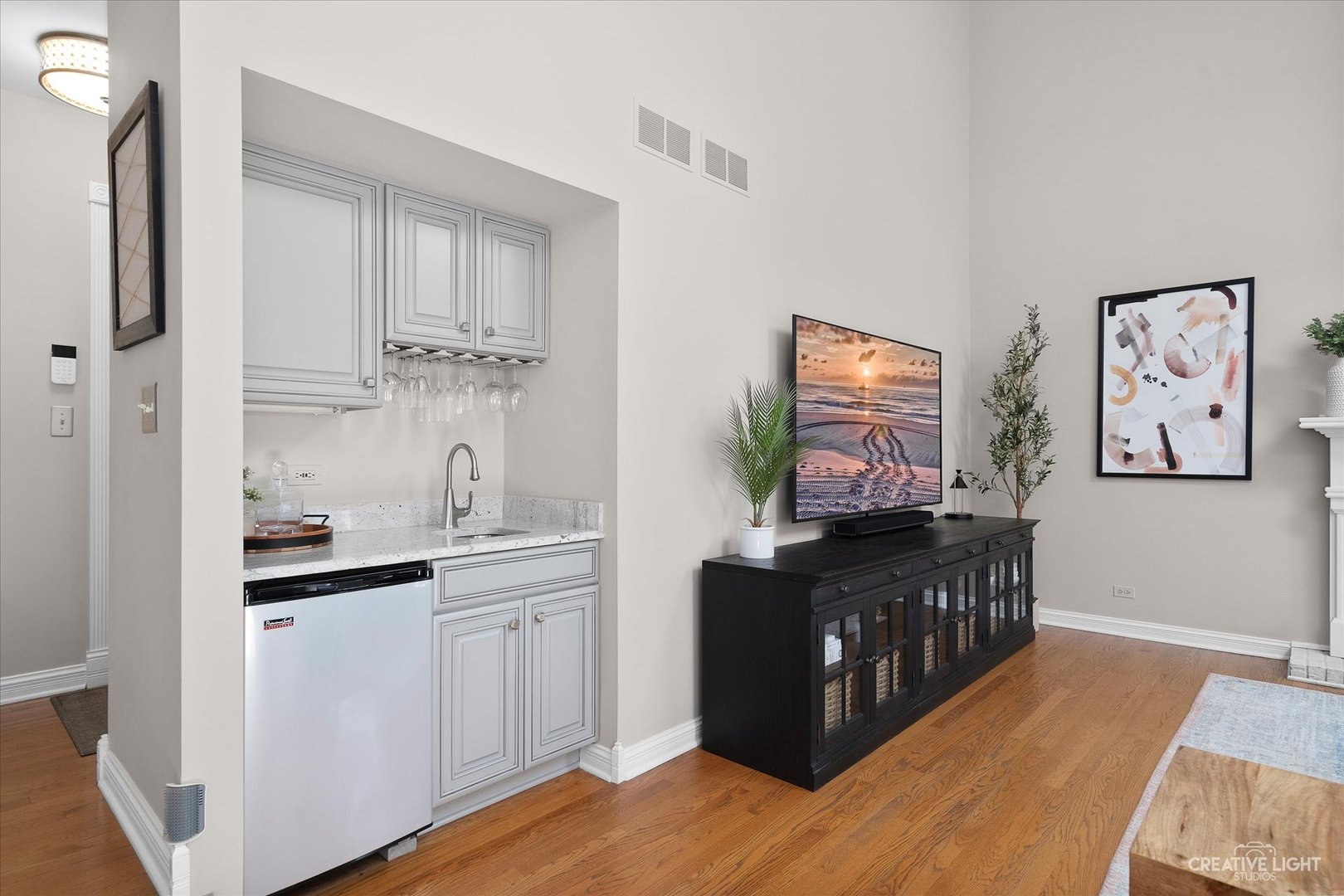 409 Flock Avenue Naperville, IL 60565 - Photo 15 of 48 a kitchen with stainless steel appliances a stove top oven a sink a refrigerator and cabinets