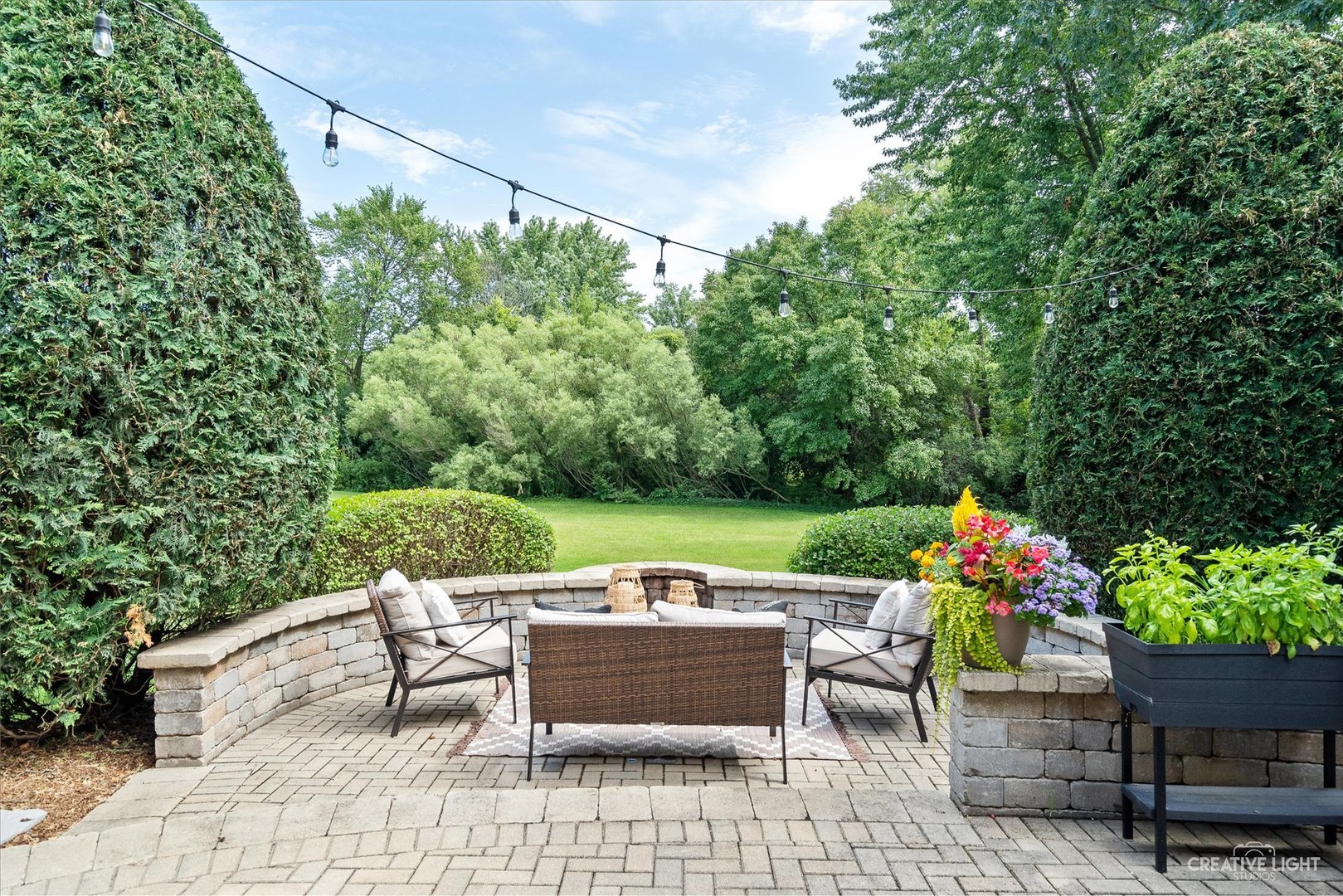 409 Flock Avenue Naperville, IL 60565 - Photo 38 of 48 a view of a chairs and table in the back yard of the house