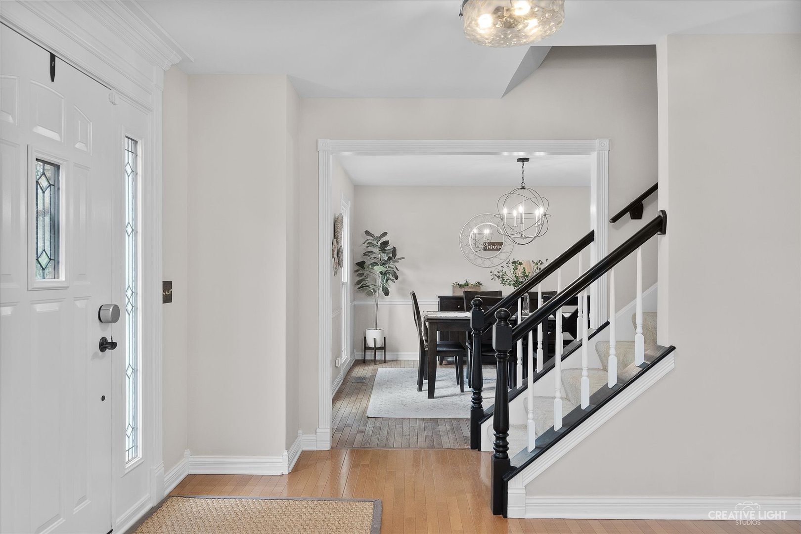 409 Flock Avenue Naperville, IL 60565 - Photo 5 of 48 a view of entryway and hall with wooden floor