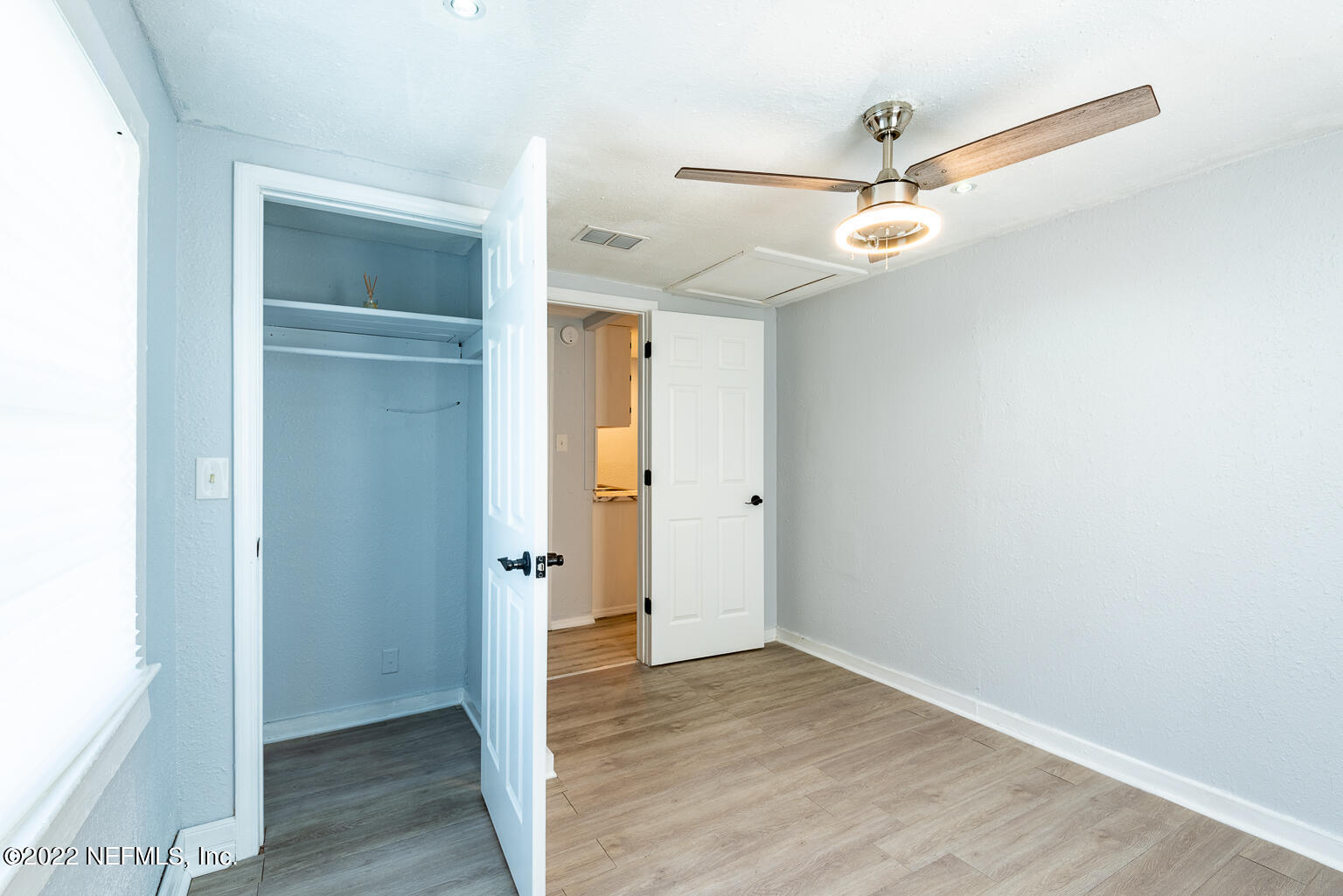 5150 107th Street Jacksonville, FL 32244 - Photo 35 of 43 an empty room and wooden door