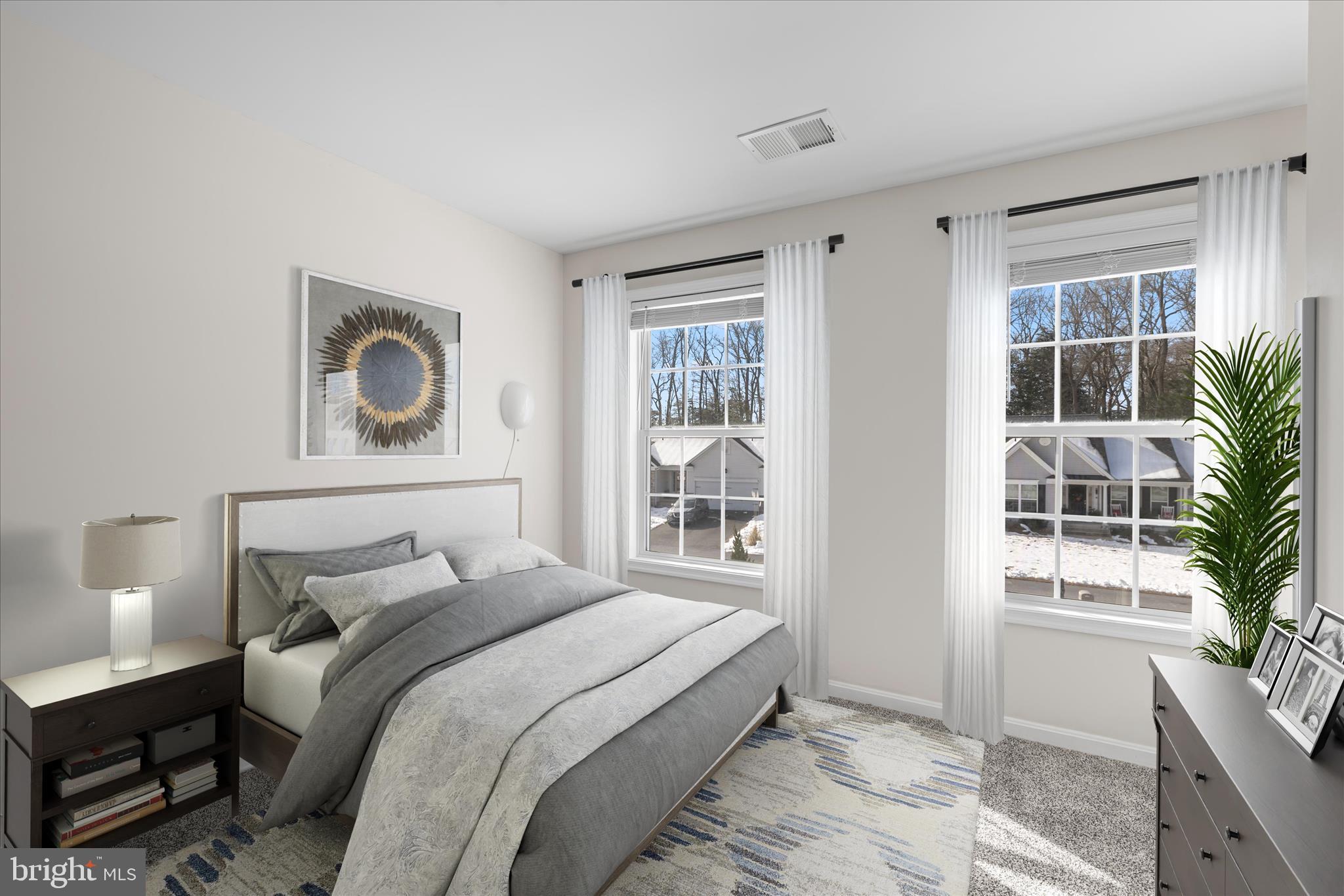 19095 Carey Lane Georgetown, DE 19947 - Photo 22 of 39 a bedroom with a bed and a window