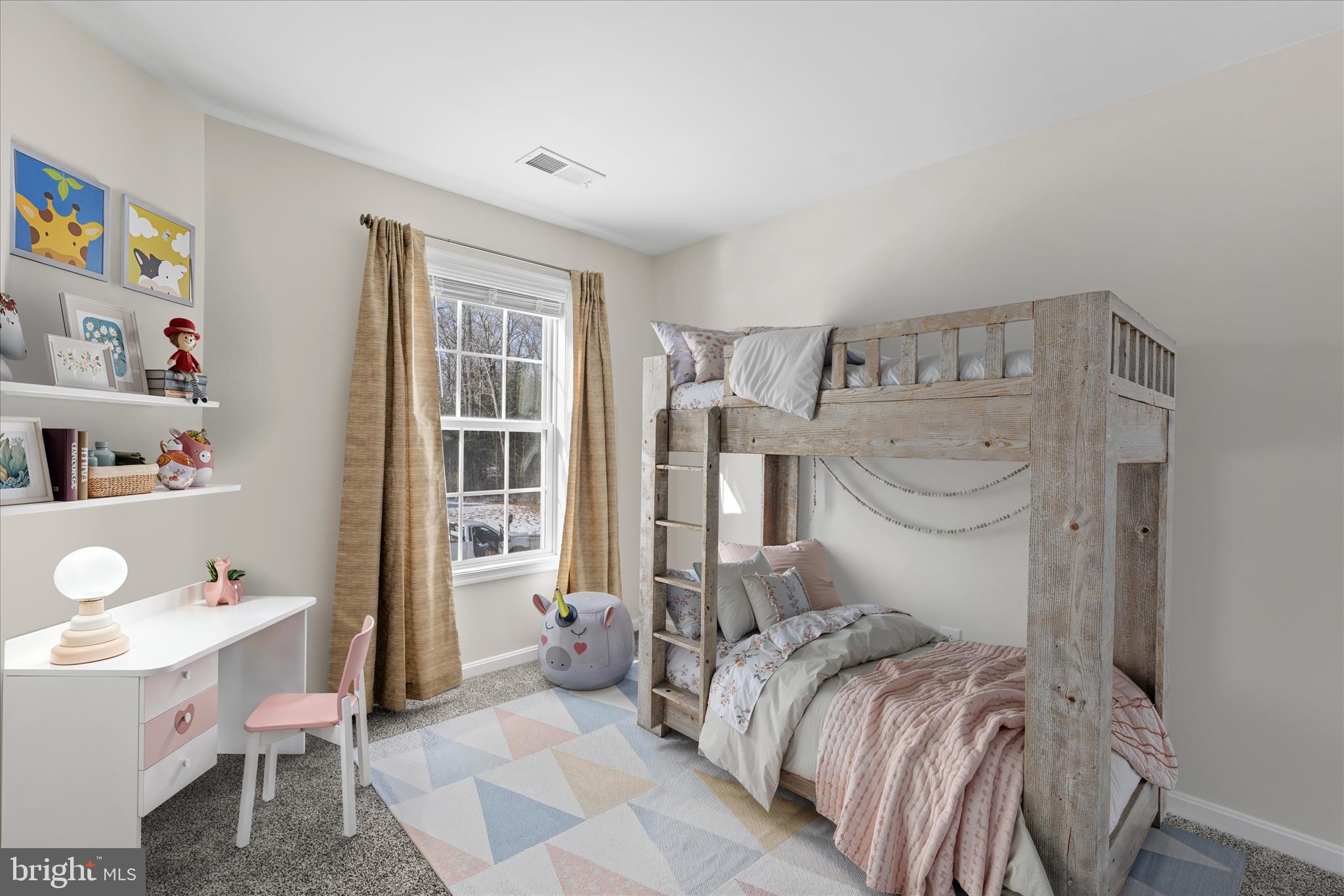 19095 Carey Lane Georgetown, DE 19947 - Photo 26 of 39 a bedroom with a bed and a window