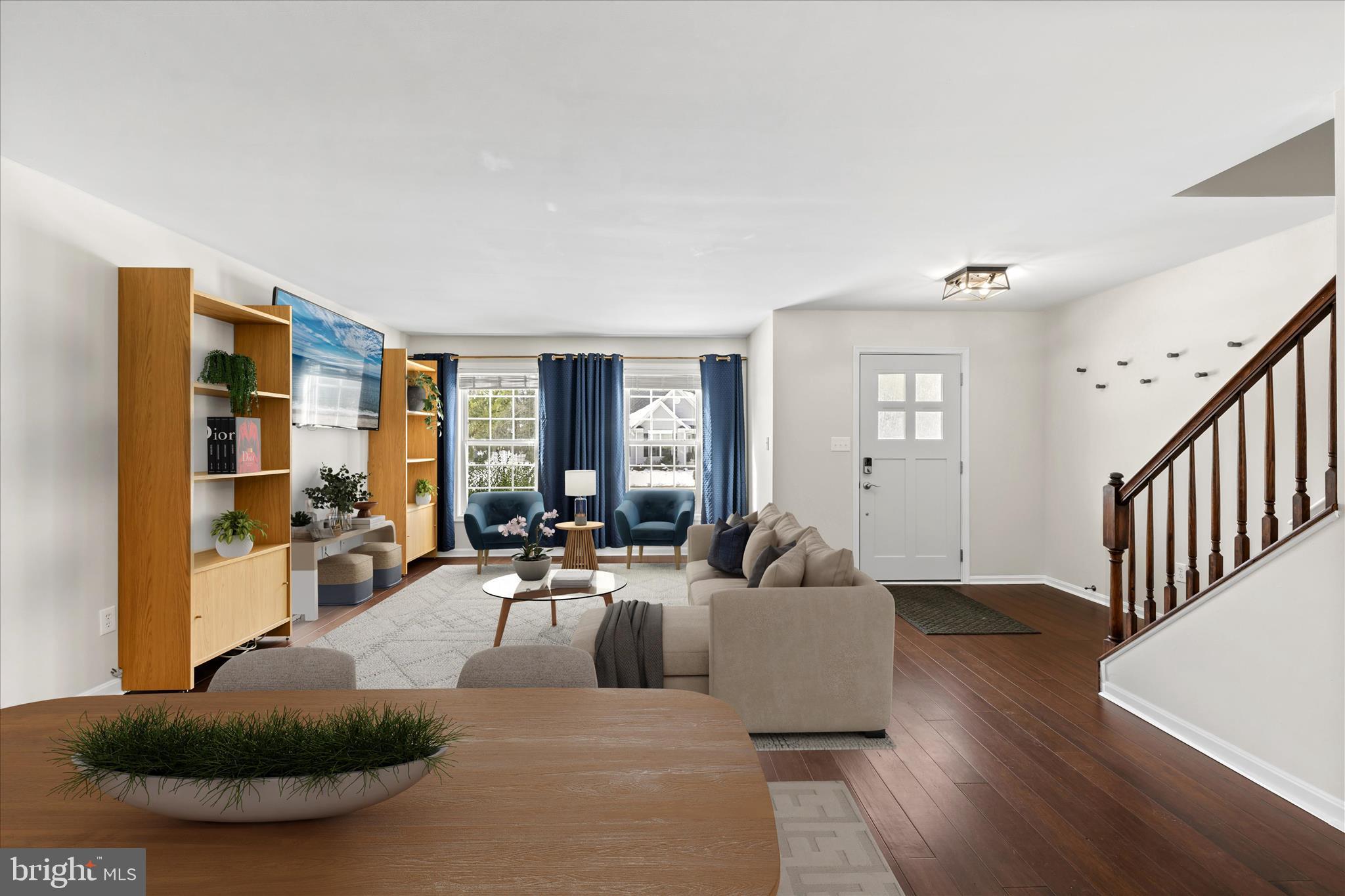 19095 Carey Lane Georgetown, DE 19947 - Photo 4 of 39 a living room with furniture large window and wooden floor