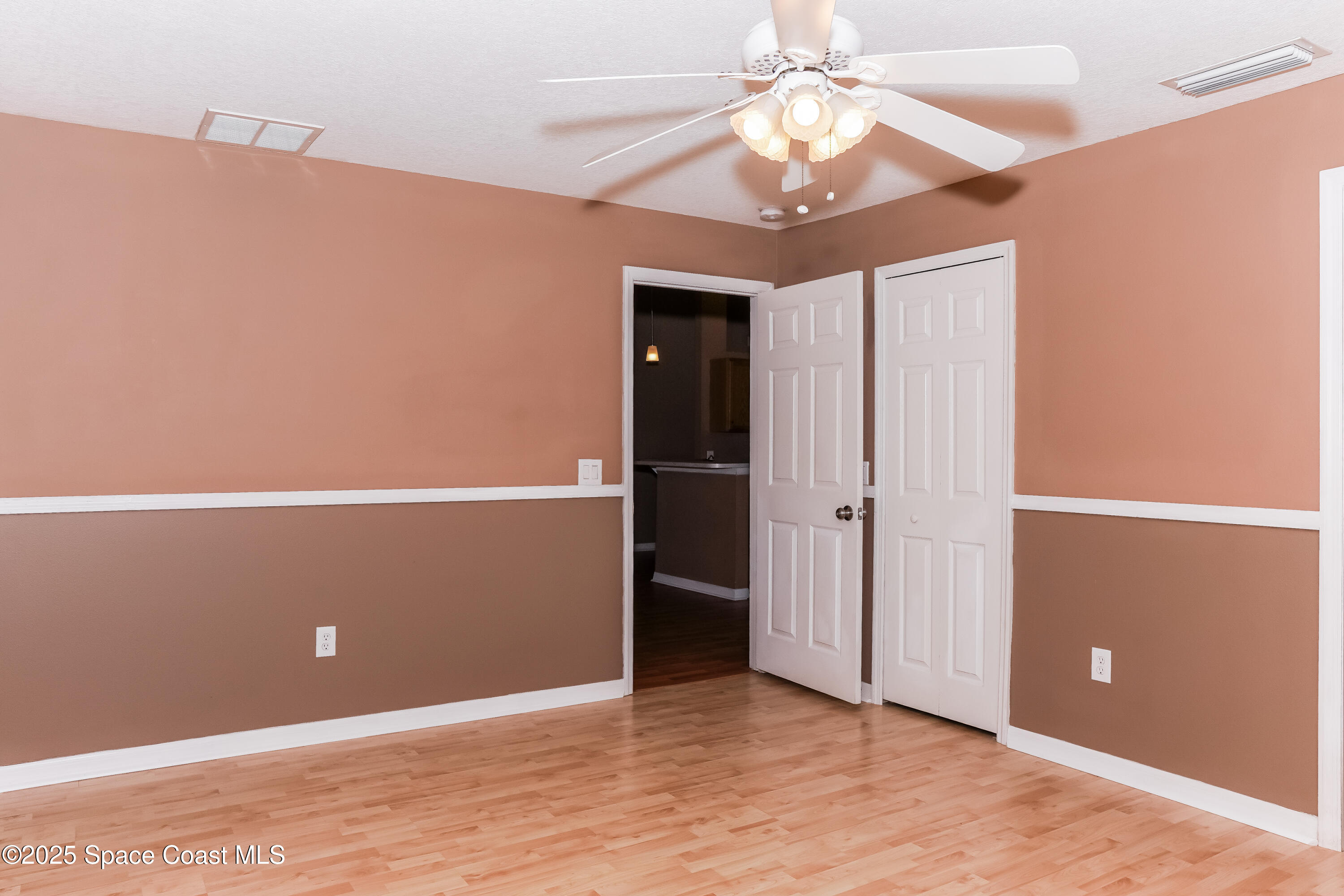 225 Gordon Road Northwest Palm Bay, FL 32907 - Photo 9 of 17 009-photo-primary-bedroom-11046489