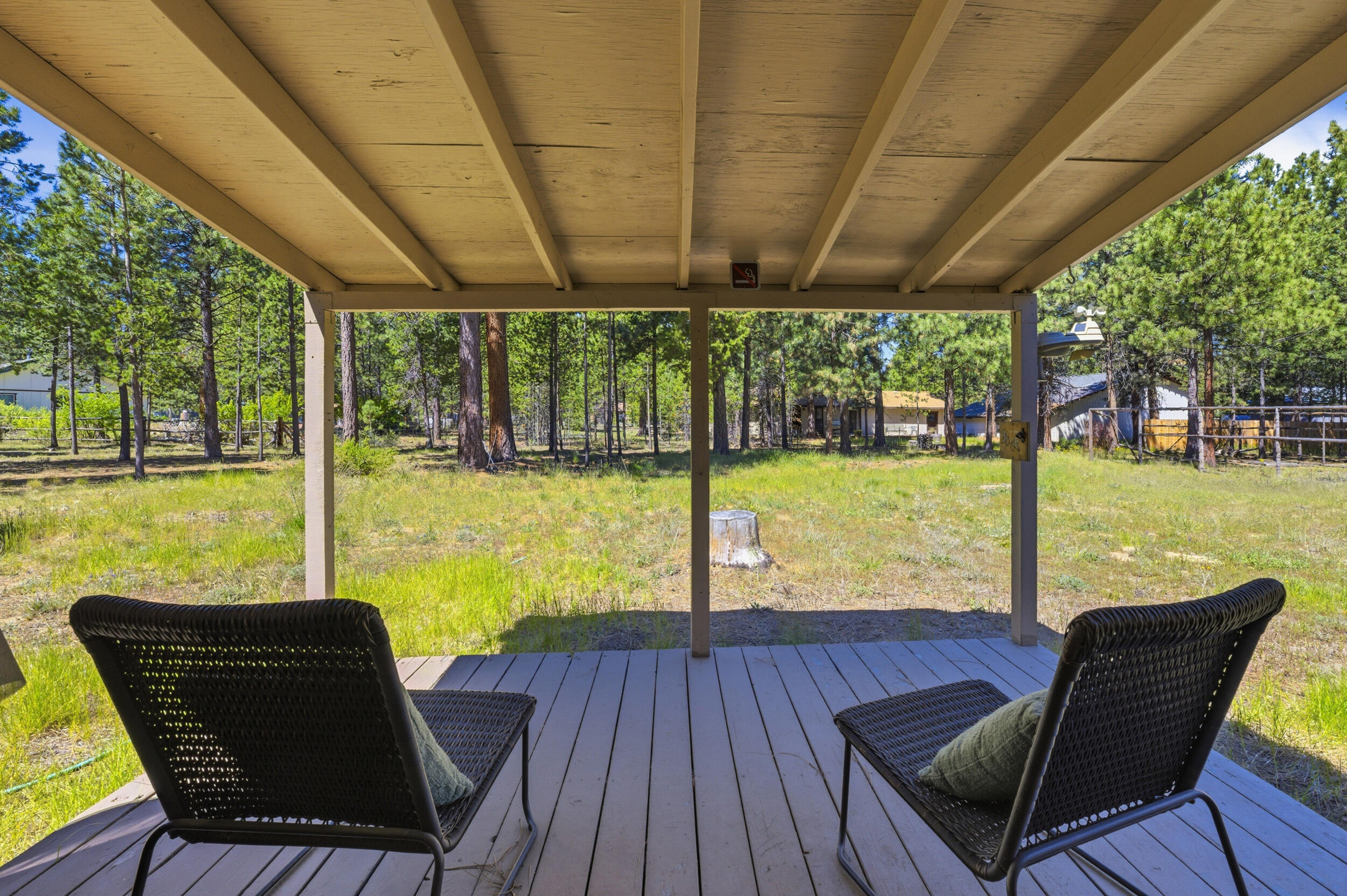 50868 Doe Loop La Pine, OR 97739 - Photo 33 of 51 a view of a chairs and table in patio with a lake view