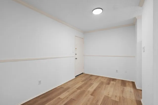 a view of a room with racks on the wall