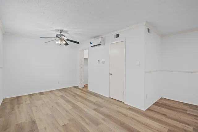 a view of room with hardwood floor