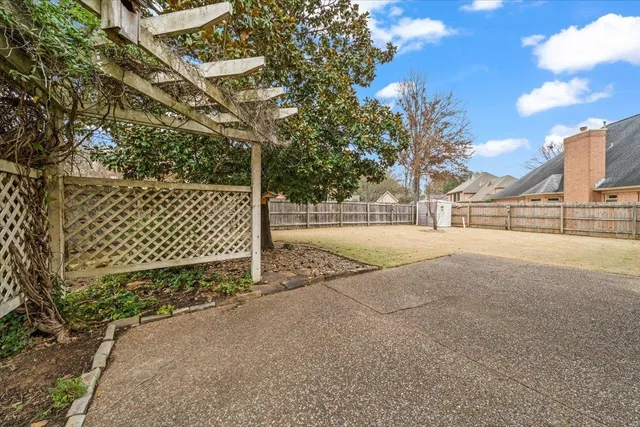 a view of a street with a building in the background