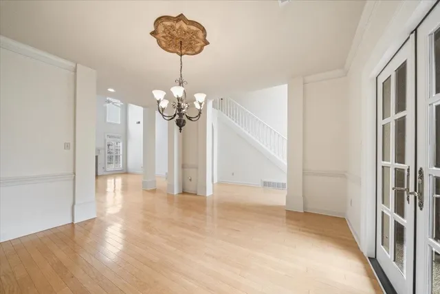 a view of a chandelier in a room with a chandelier